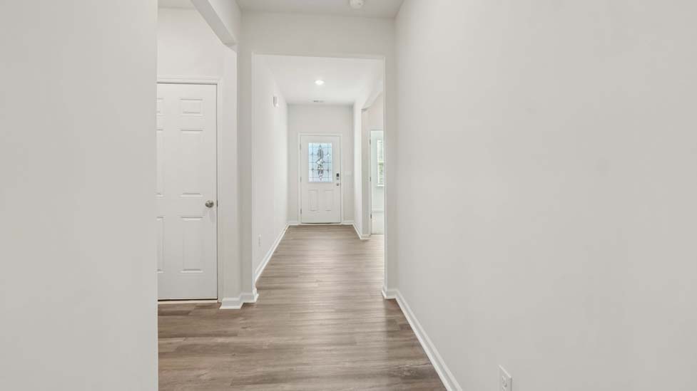 Welcoming foyer with wood floors, view of home interior