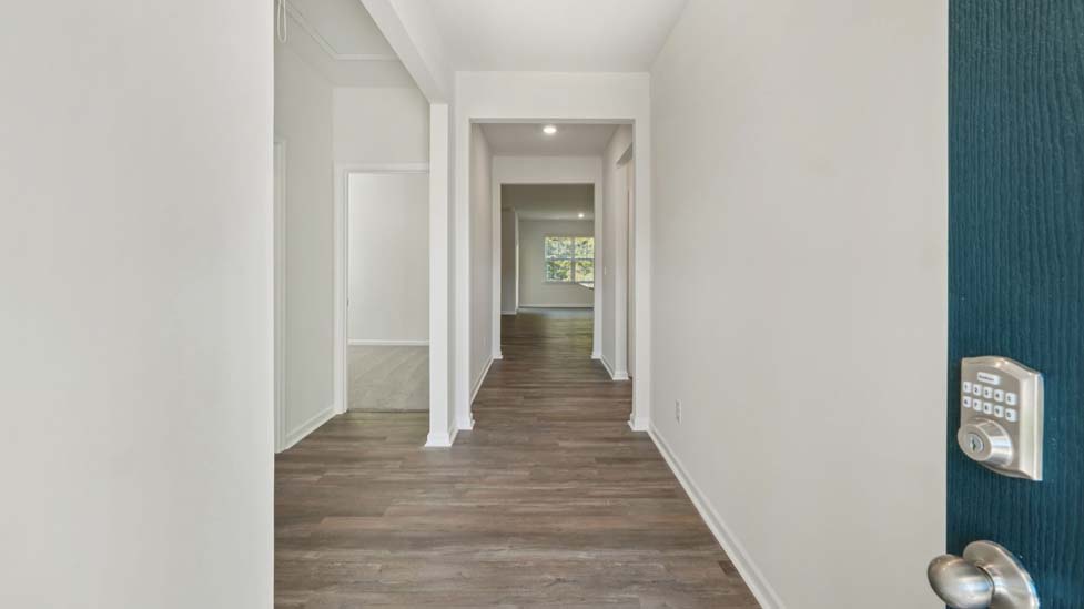 Welcoming foyer with wood floors, view of home interior