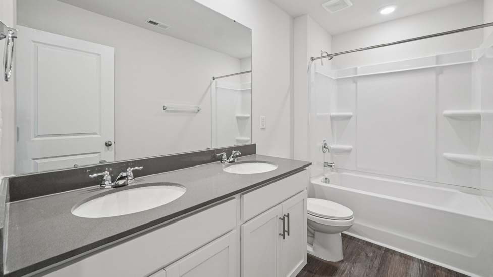 Bathroom with bathtub shower combo