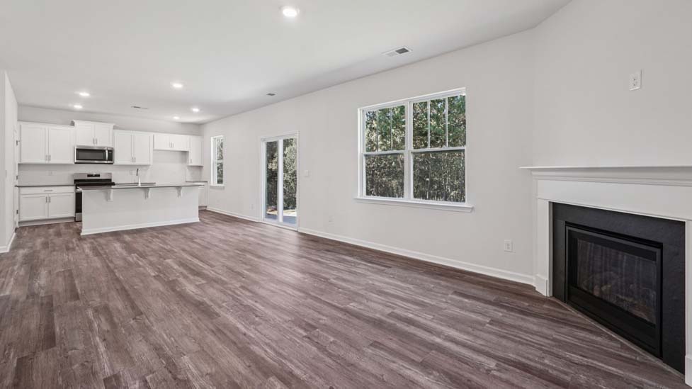 Living room with sliding glass doors and fireplace