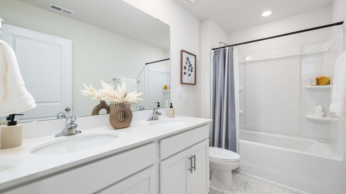 bathroom with bathtub shower combo