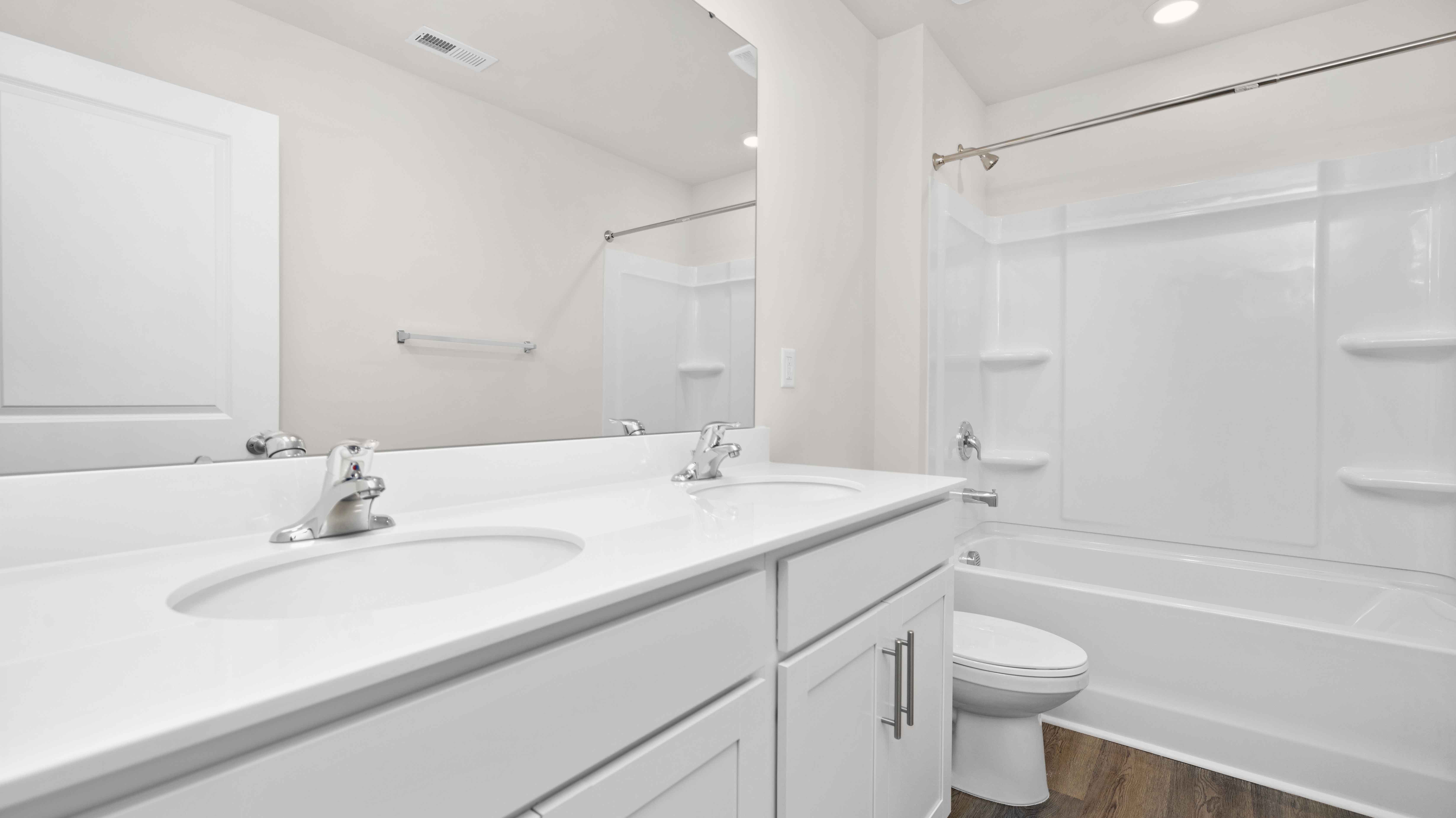 bathroom with bathtub shower combo