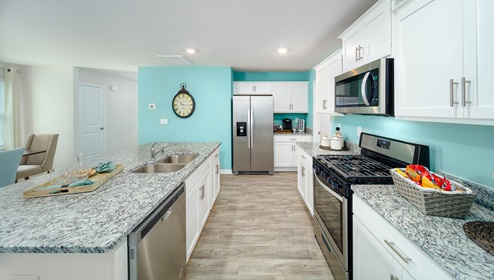 Kitchen and island, white cabinets,
