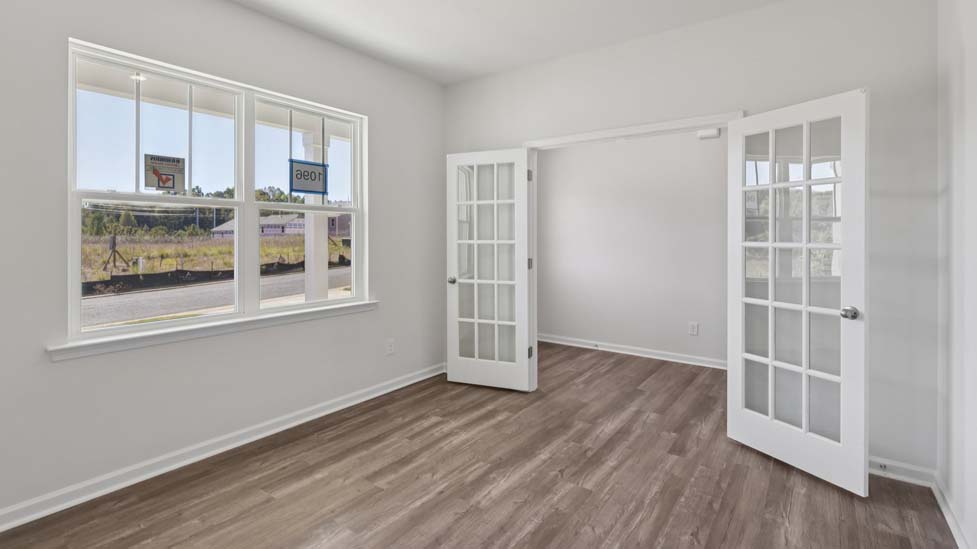 flec or office space with french doors and large window