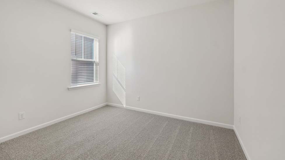 carpeted bedroom