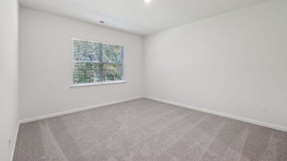 carpeted bedroom