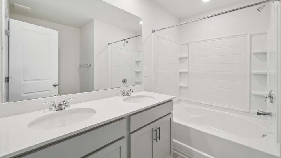 Bathroom with bathtub shower combo