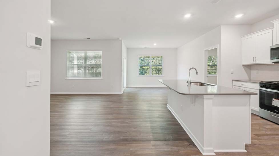 kitchen and island with stainless steel appliances
