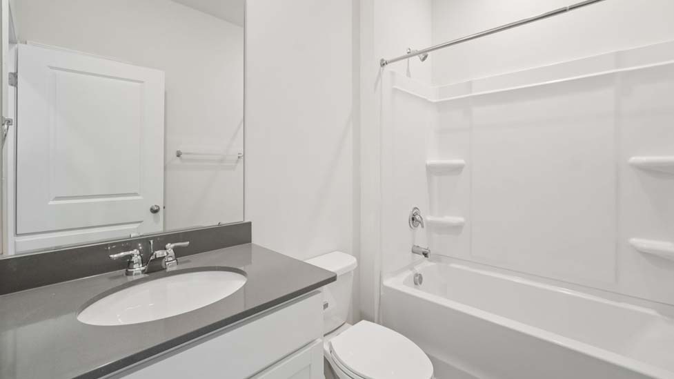 Bathroom with bathtub shower combo