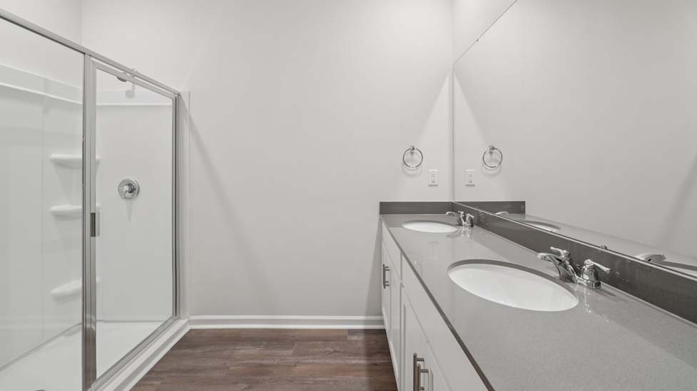 primary bathroom with double sink vanity