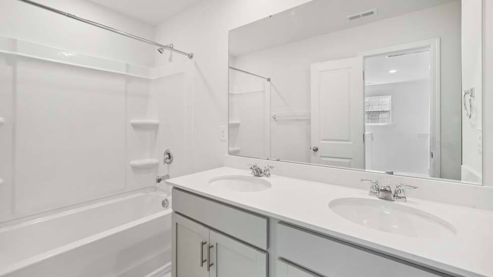 Bathroom with bathtub shower combo