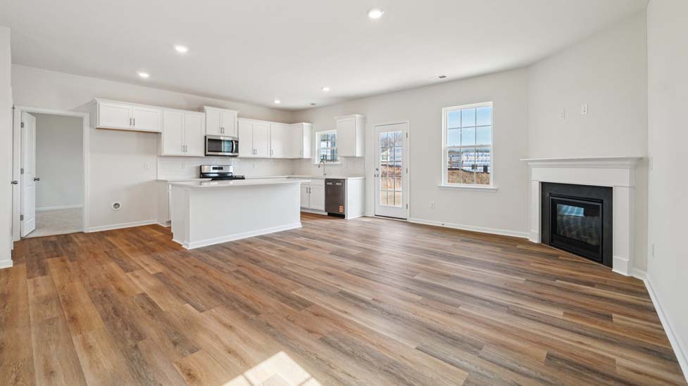 kitchen and island with stainless steel appliances