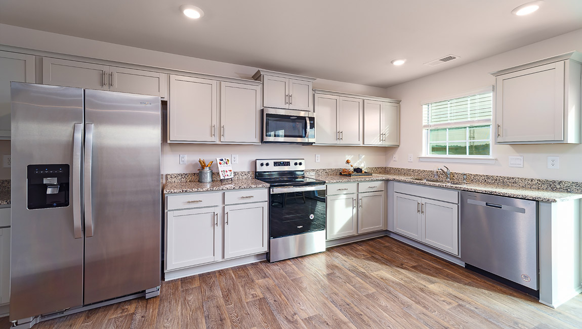 Kitchen with white cabinets