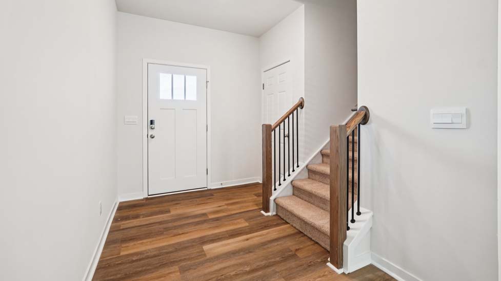 Welcoming fouyer with staircase