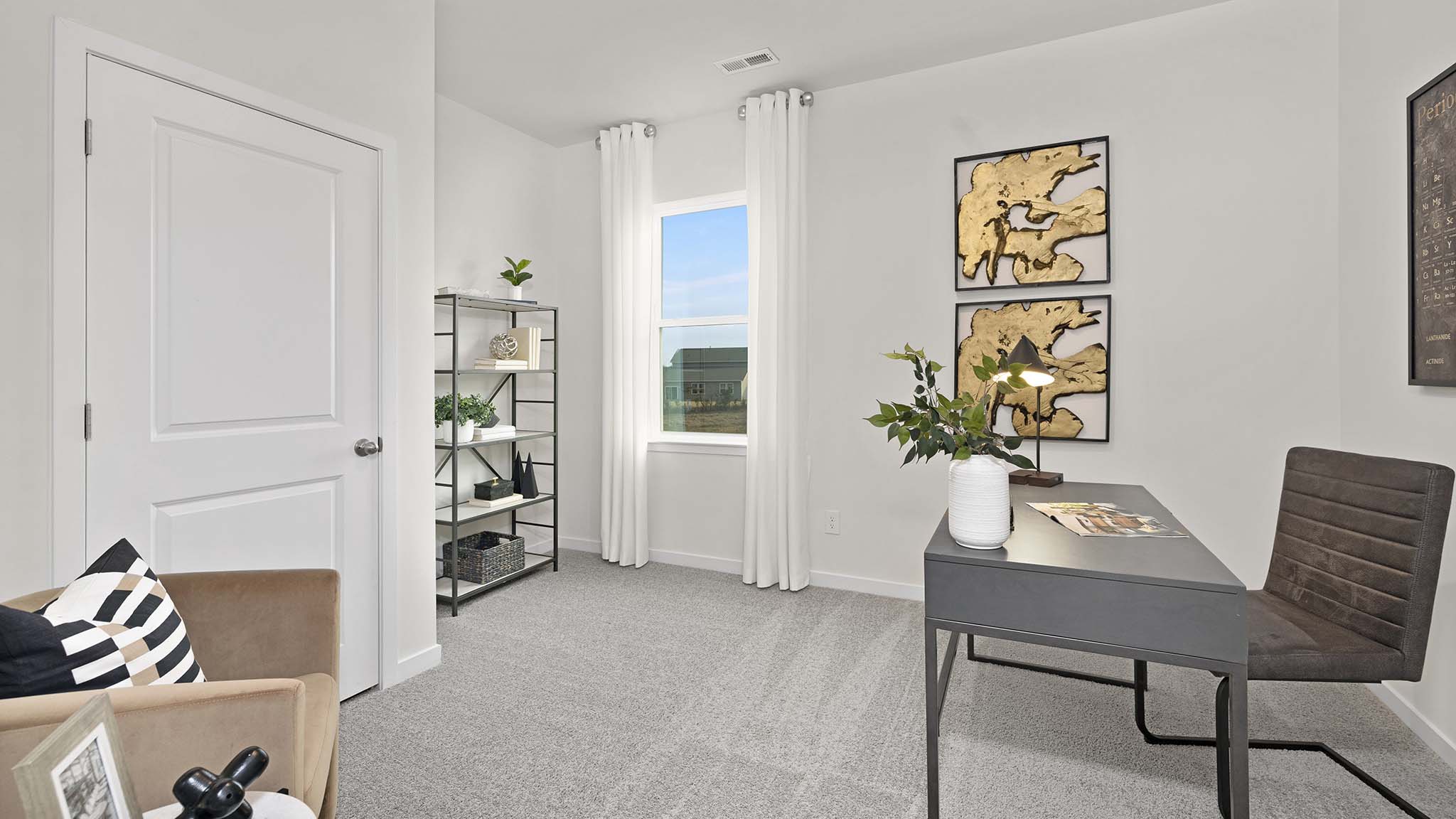 Carpeted bedroom with large window