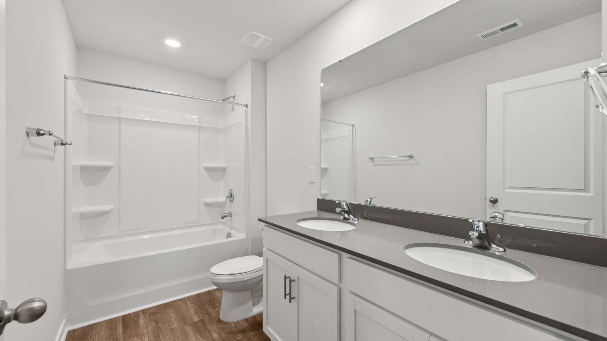 Bathroom with standing glass shower