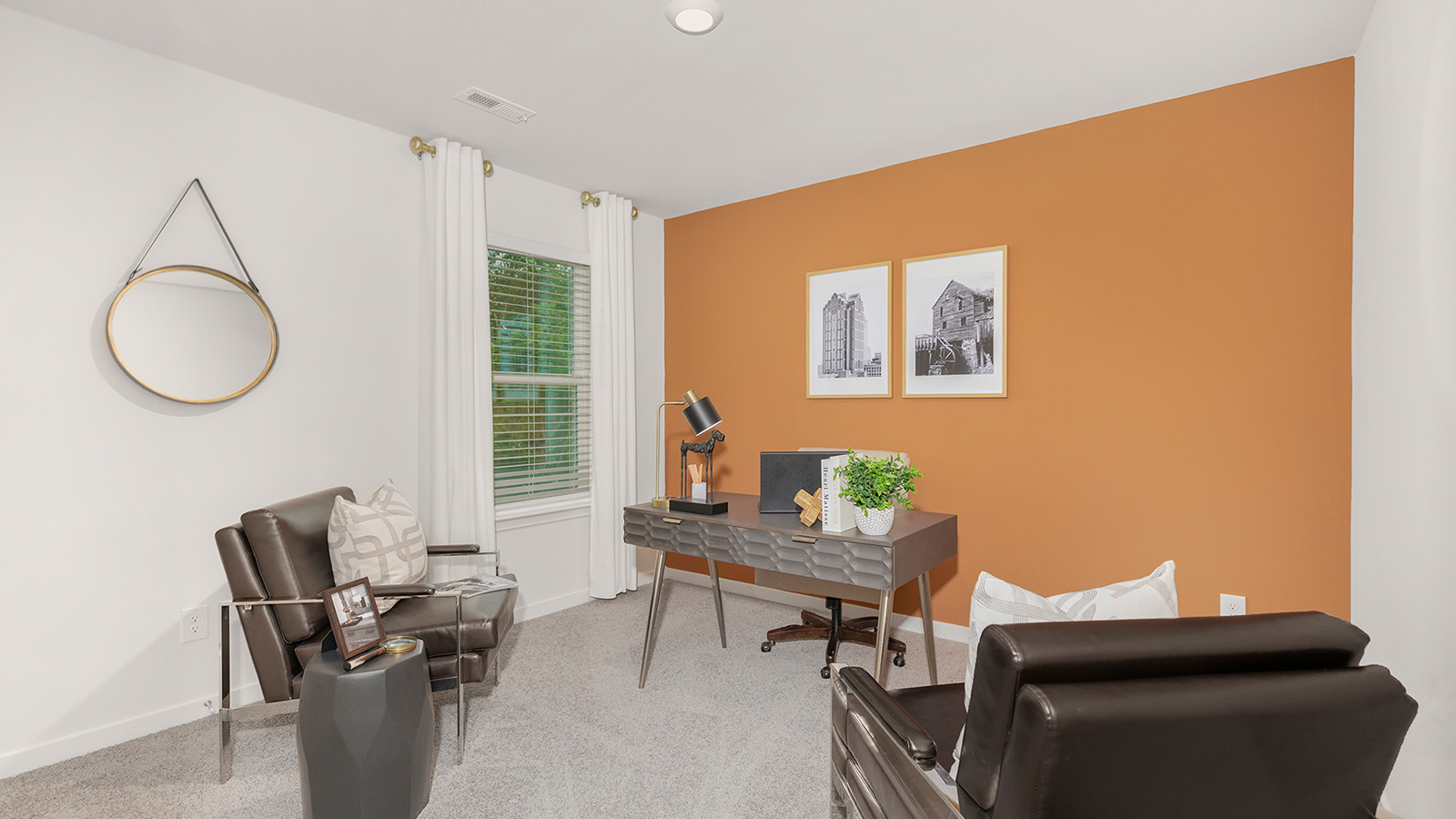 Carpeted bedroom with large window