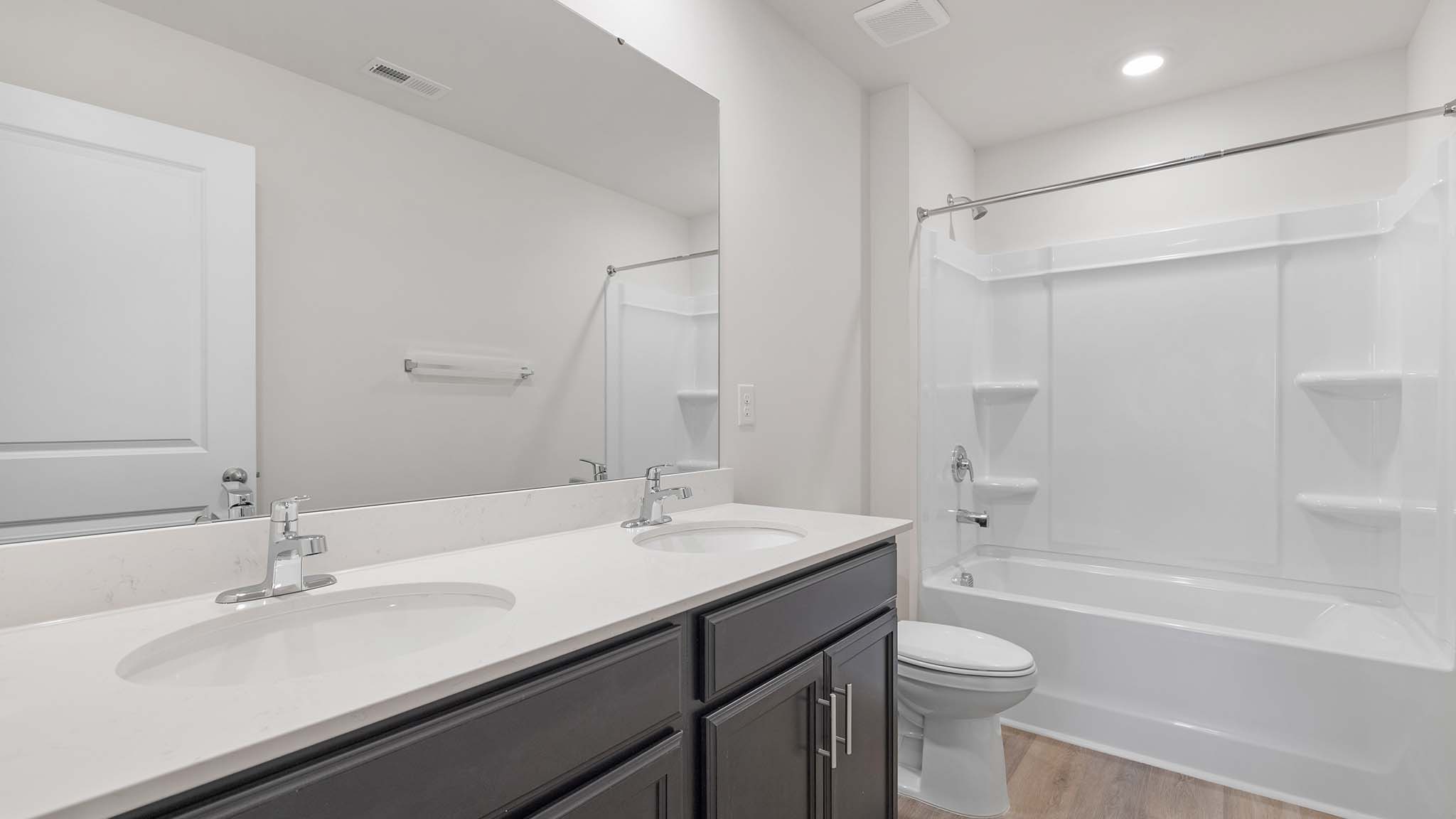 Bathroom with standing glass shower