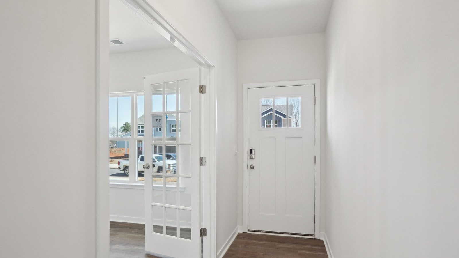 welcoming foyer with wood floors