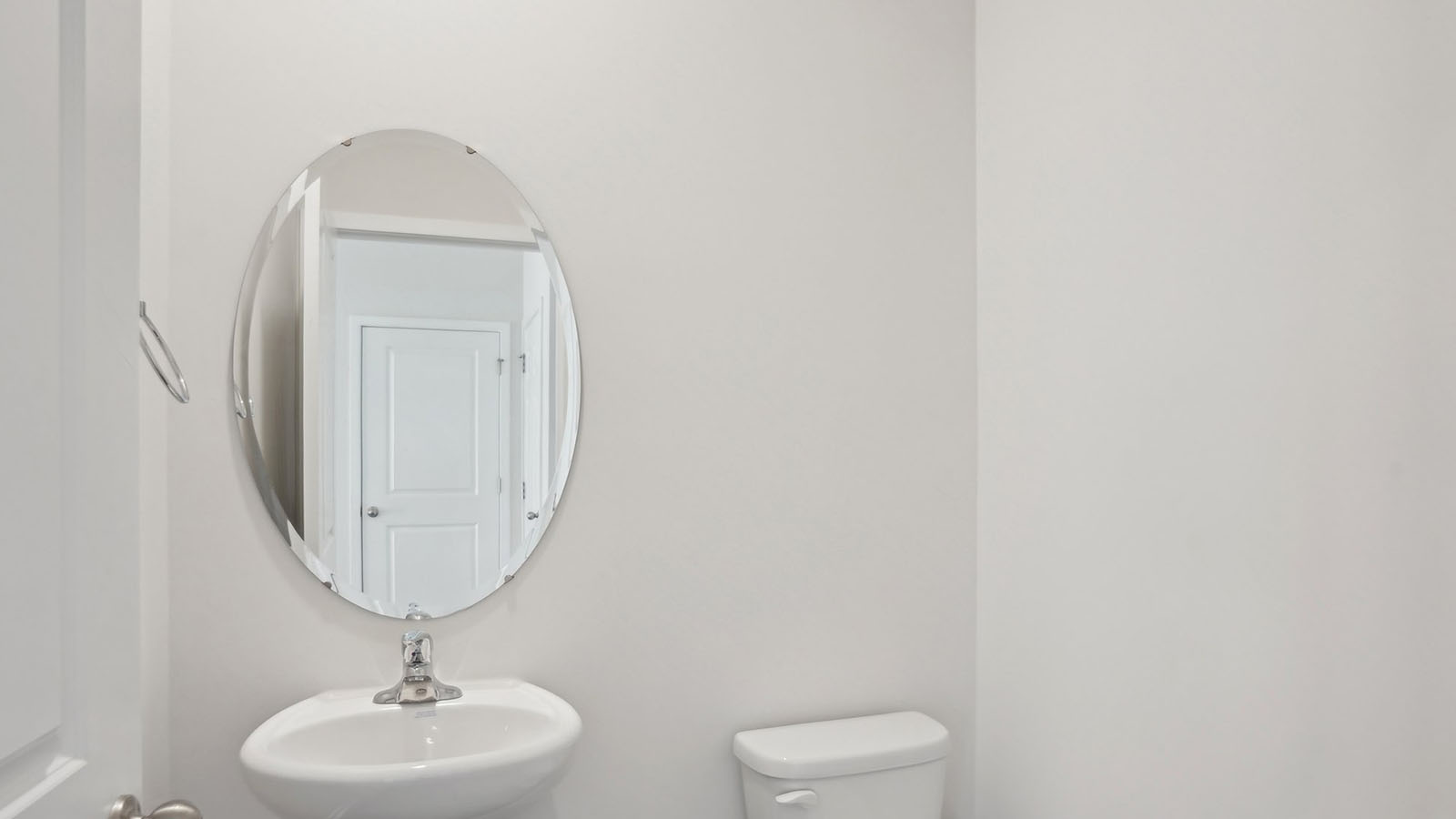 powder bathroom with sink and toilet
