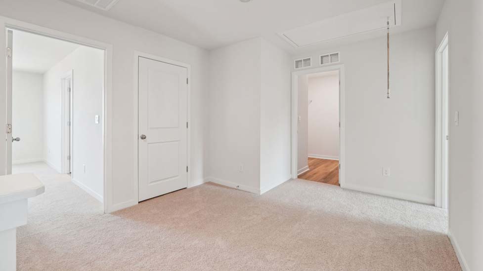 Upstairs carpeted loft