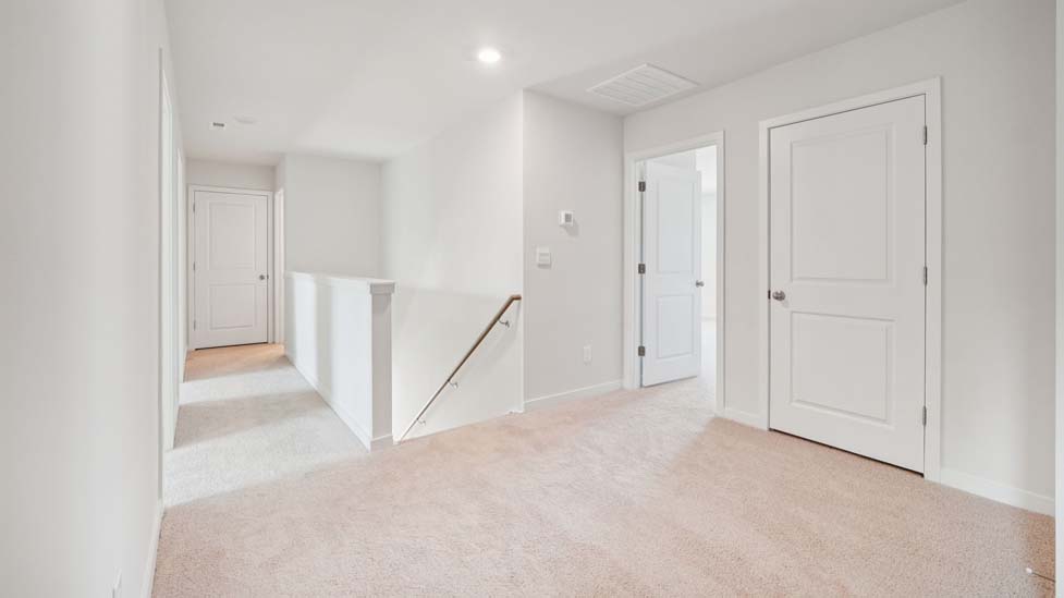 Upstairs carpeted loft