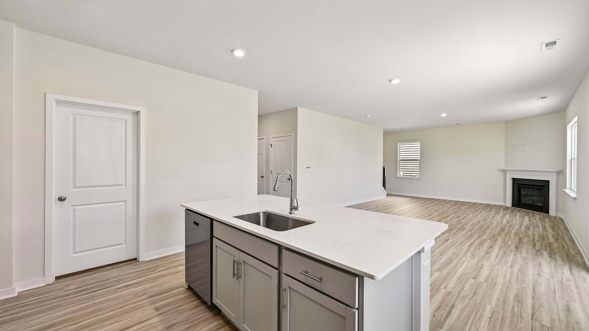 kitchen and island with stainless steel appliances