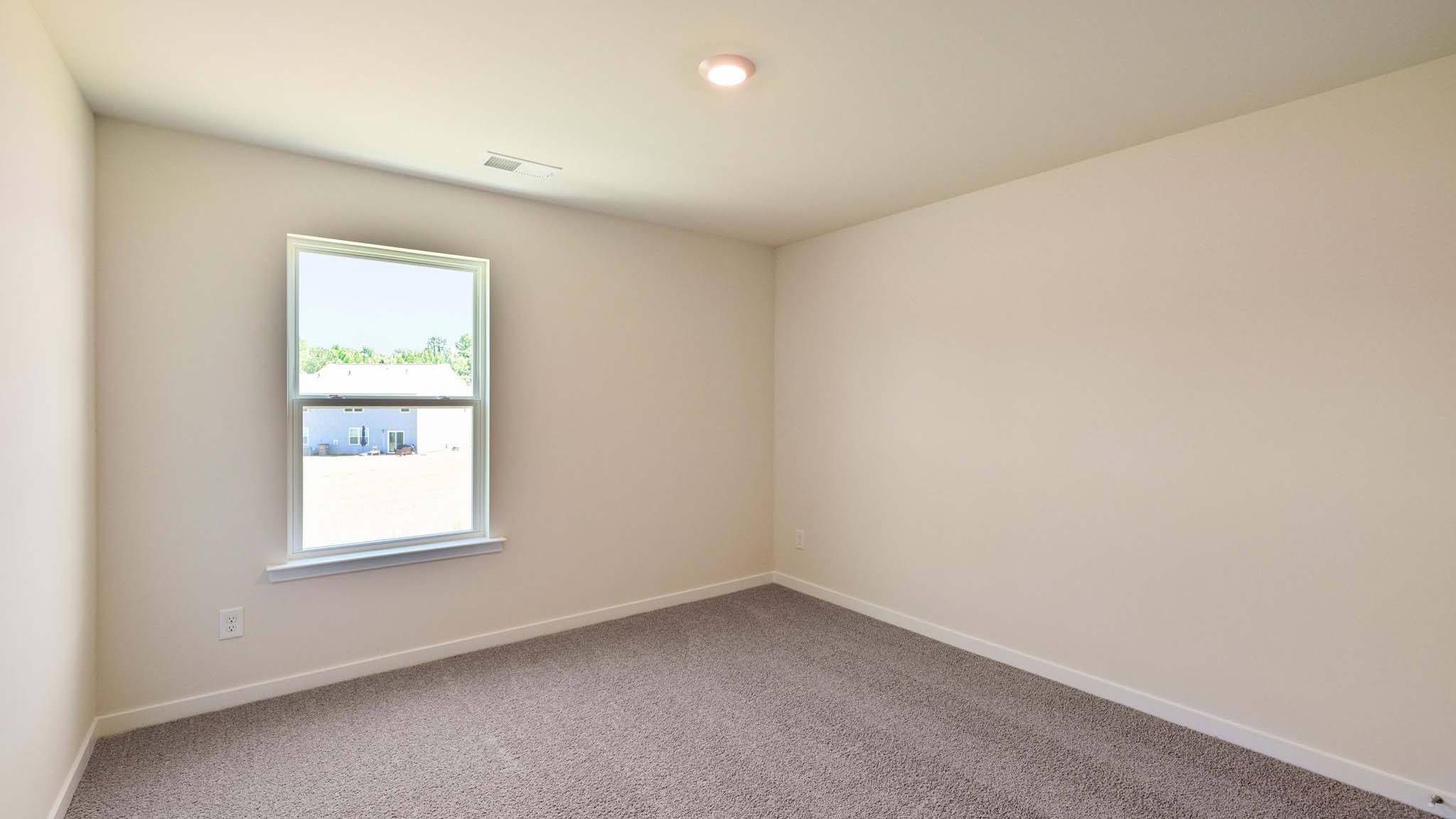 carpeted bedroom