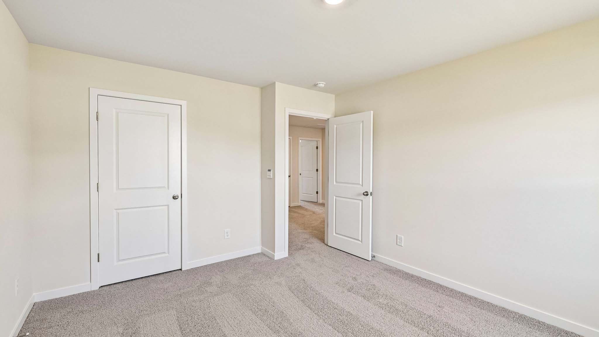 carpeted bedroom