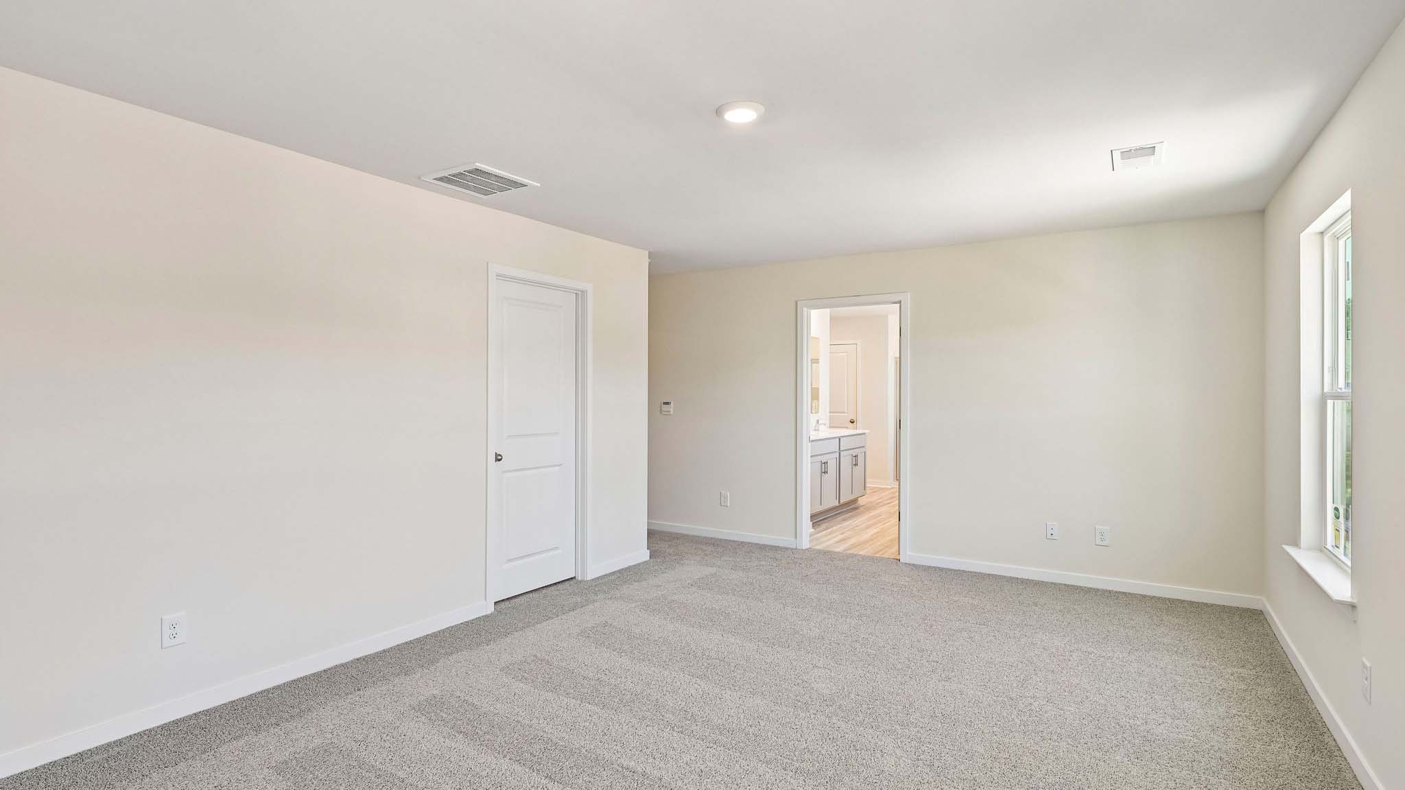 carpeted bedroom
