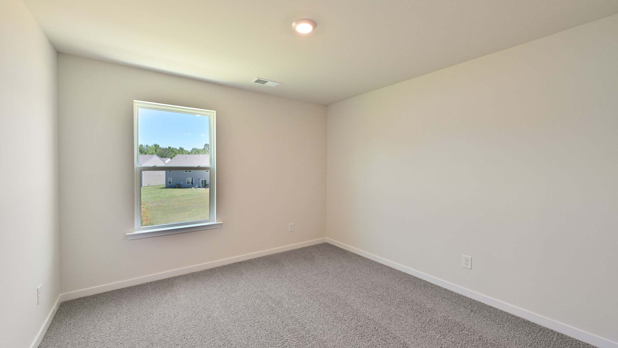 carpeted bedroom