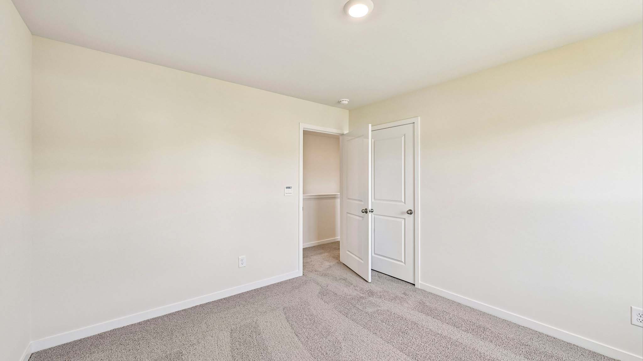 carpeted bedroom