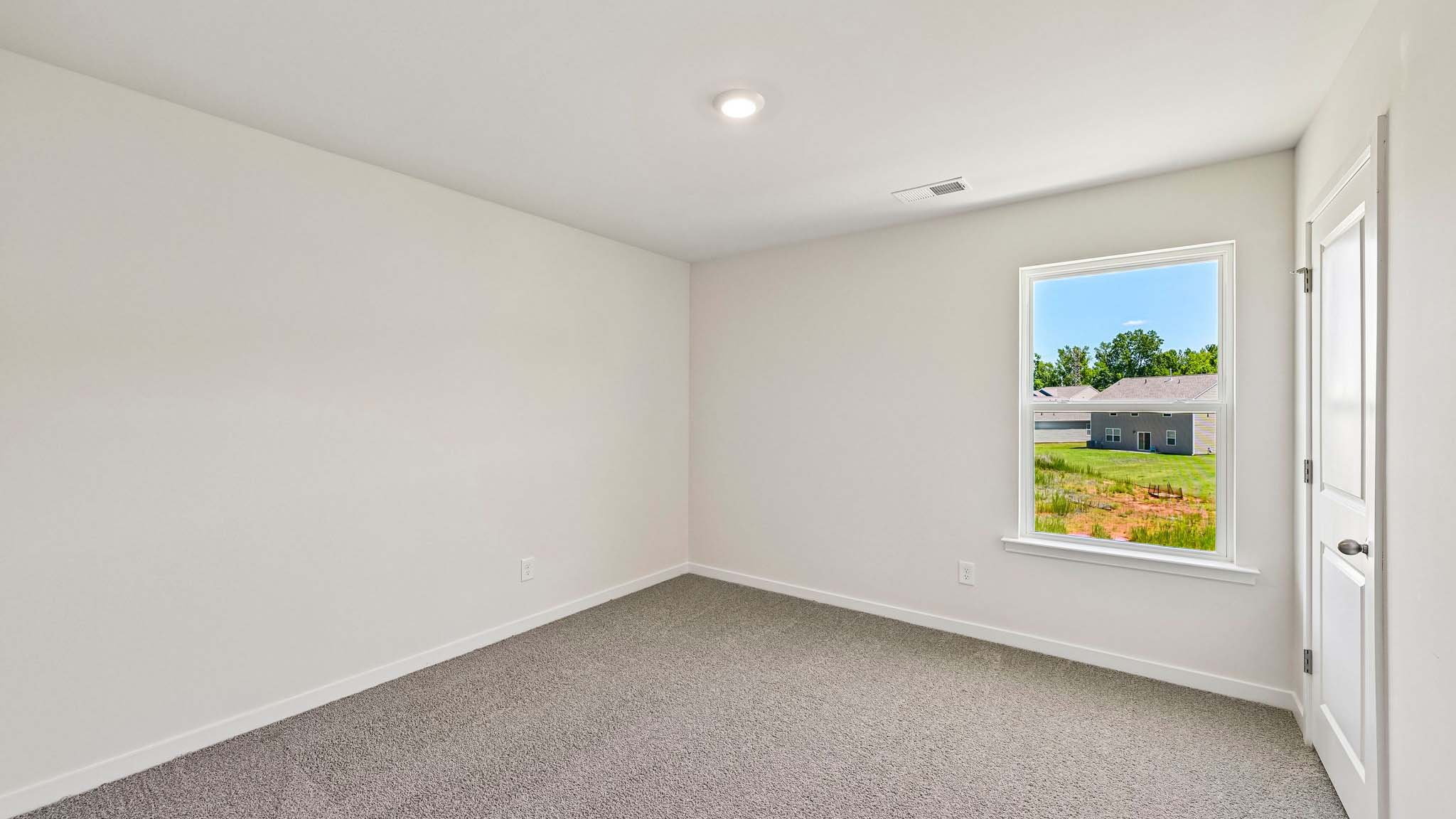 carpeted bedroom