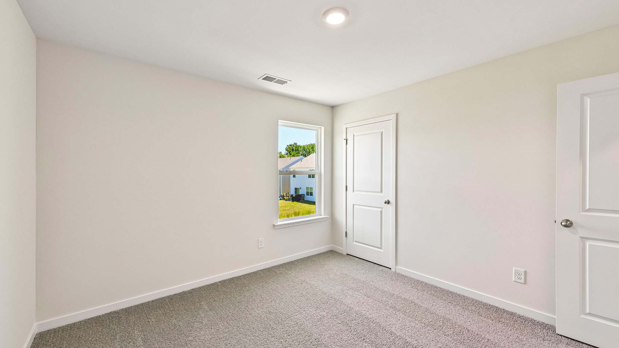 carpeted bedroom