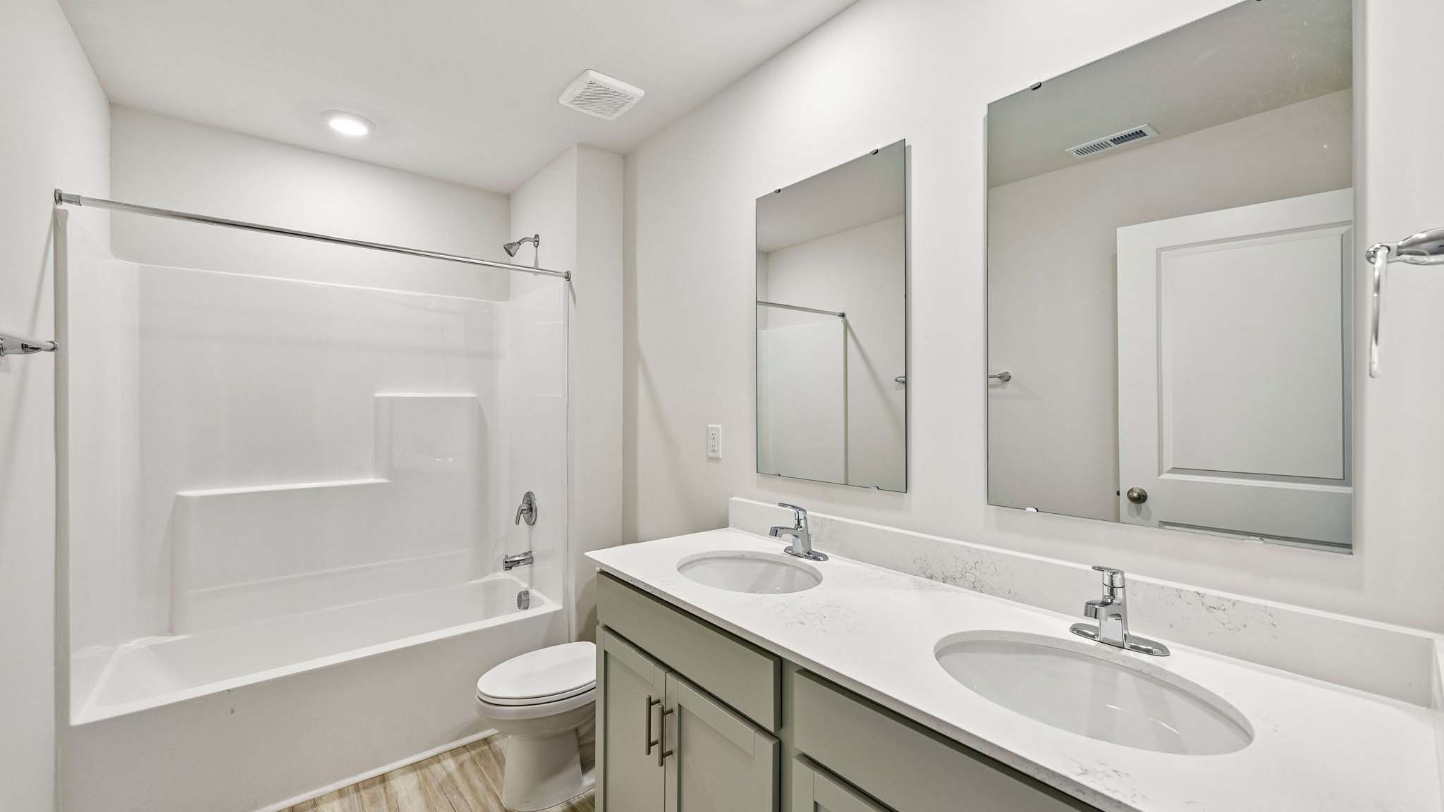 bathroom with bathtub shower combination