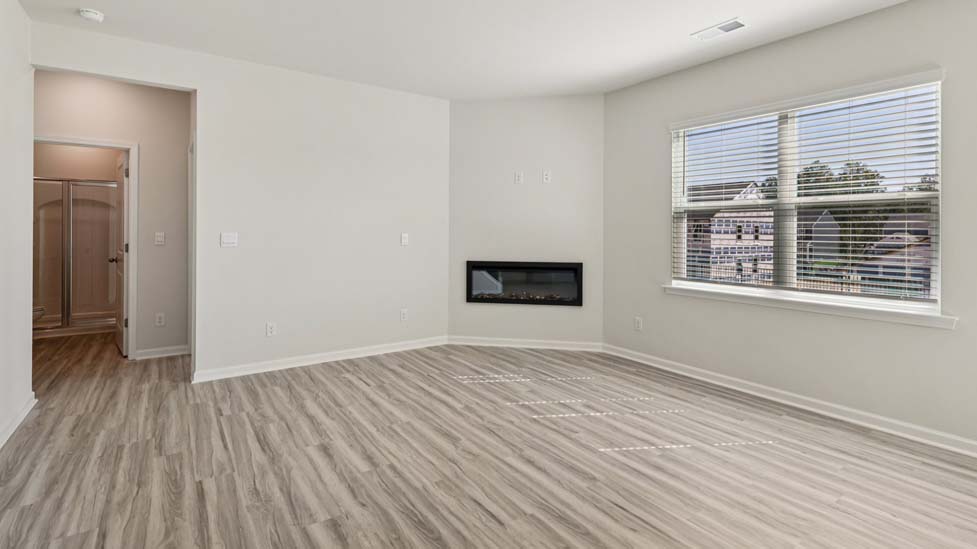Living room with fireplace and windows