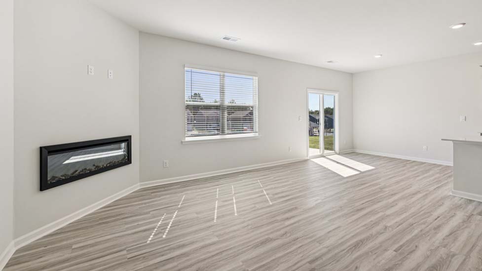 Living room with fireplace and windows