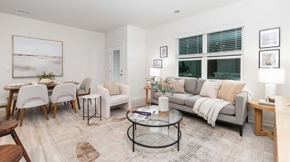Living room with view of kitchen