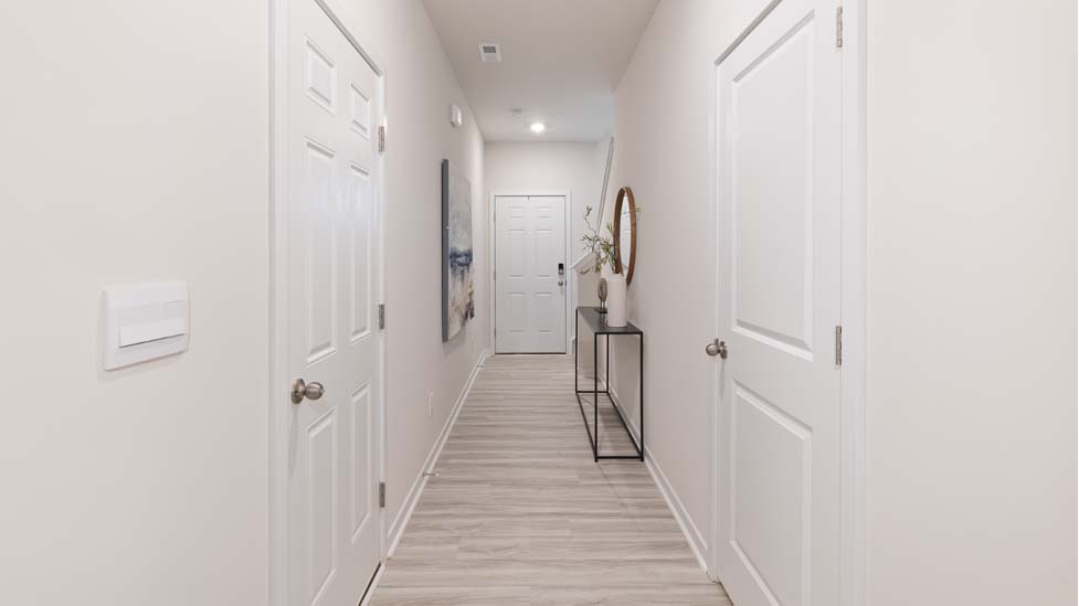 Welcoming foyer with view of stairs