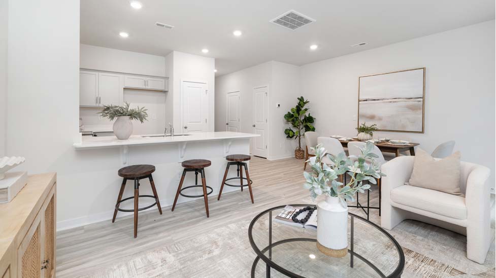 Living room with view of kitchen