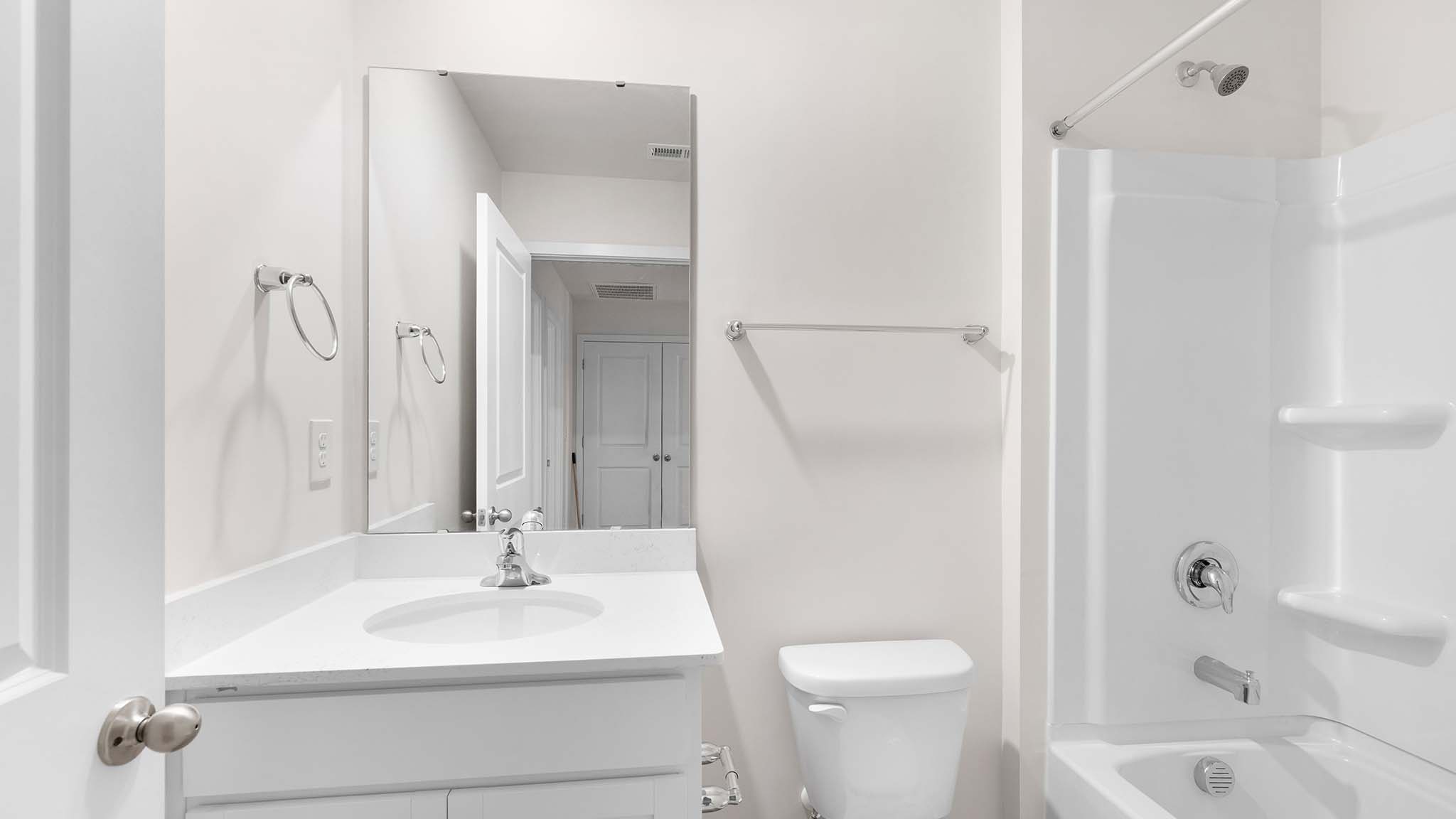 bathroom with shower tub combination