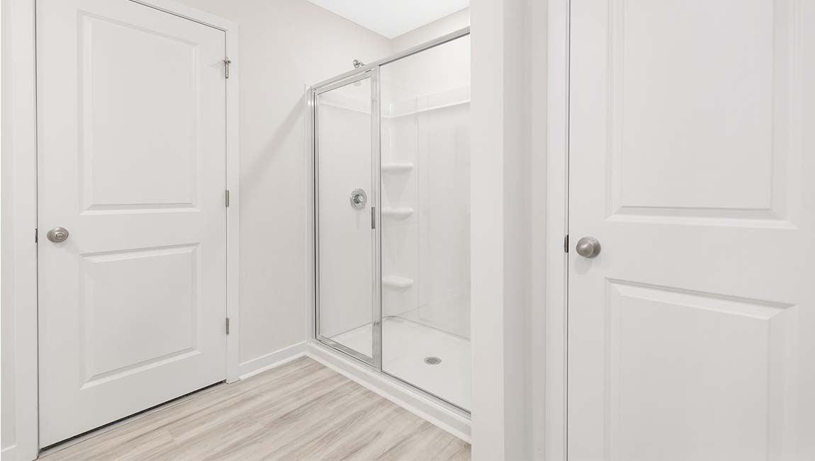 Primary bathroom with glass door shower