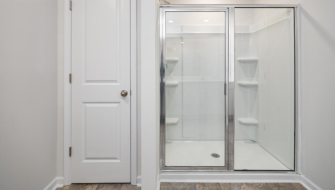 Primary bathroom with glass door shower