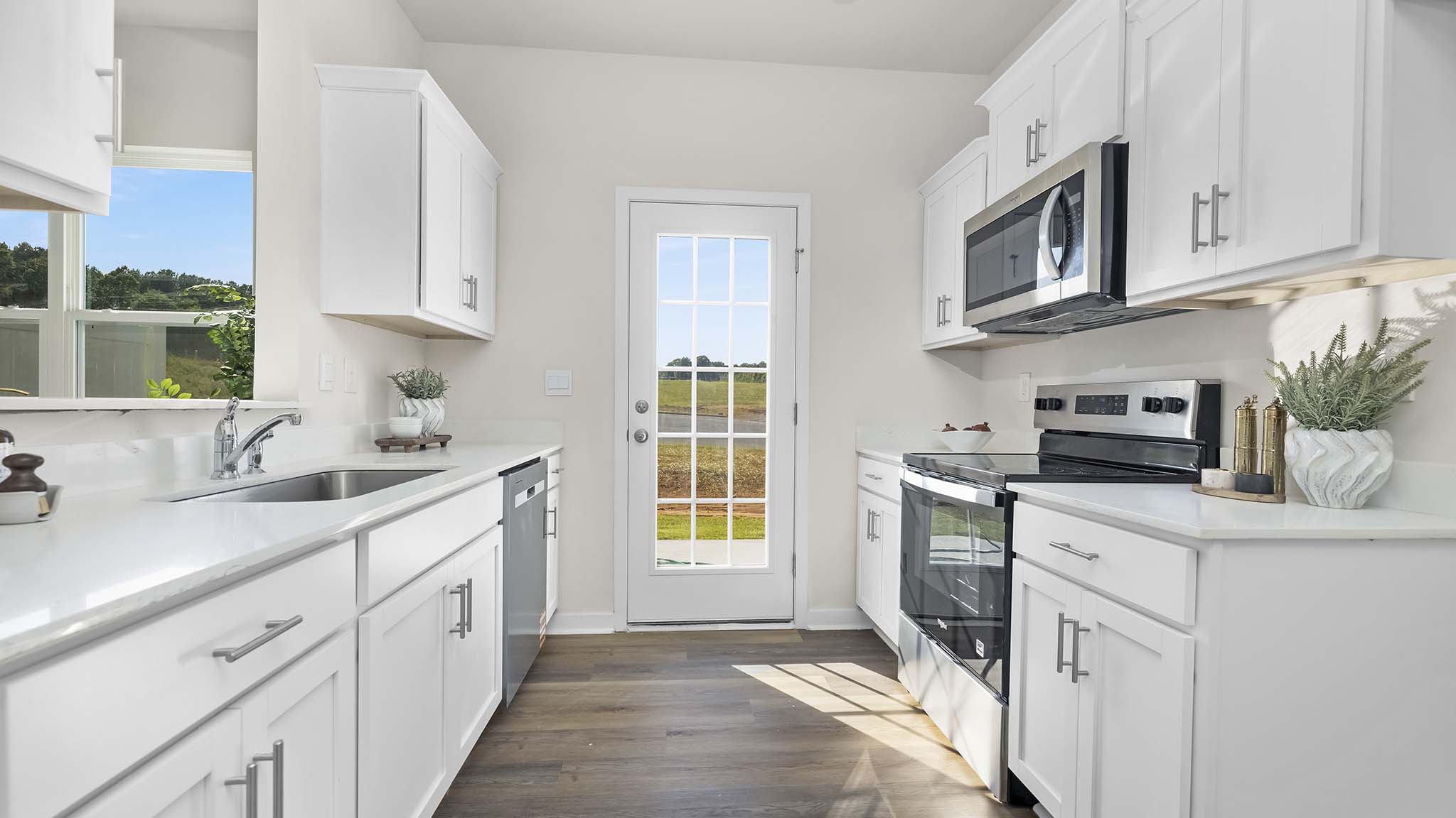 kitchen with white cabinets, and stainless steel appliances