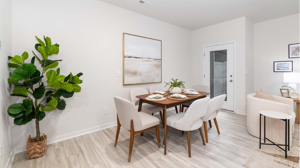 dining area beside kitchen and living room