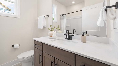 Primary bathroom with double sink vanity