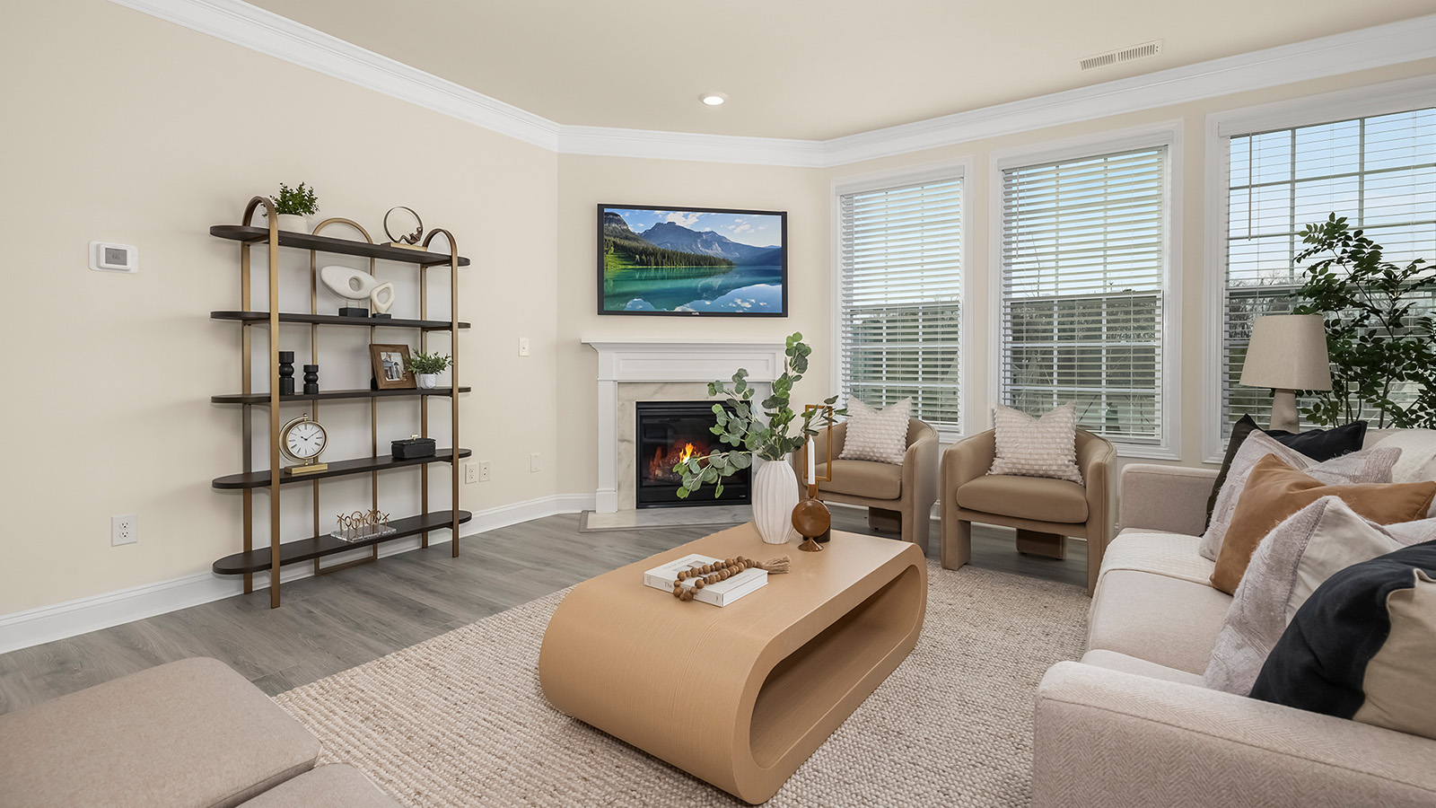 living room beside kitchen with fireplace