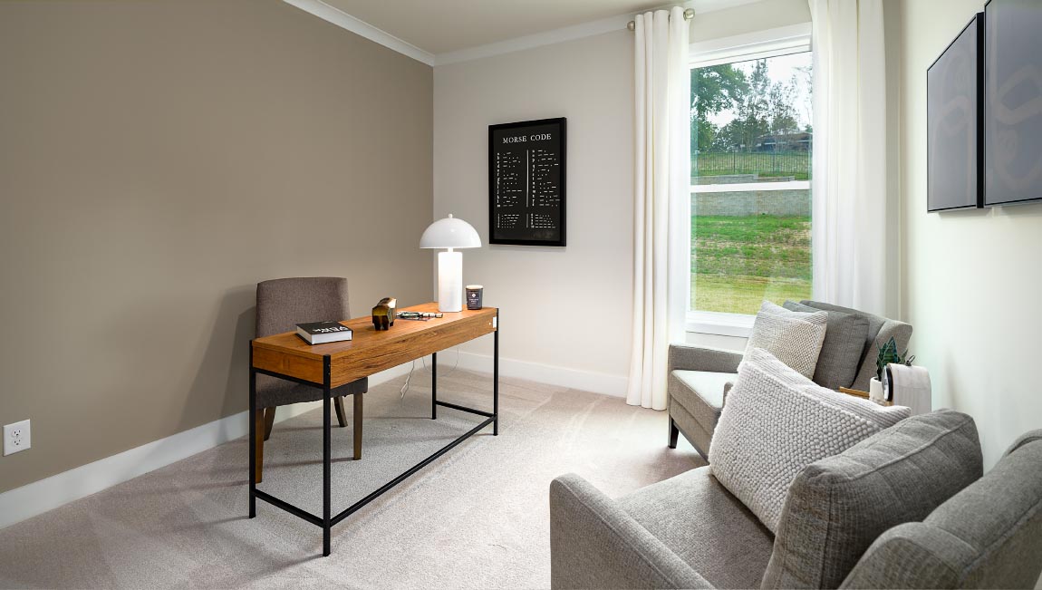 Carpeted bedroom with large windows