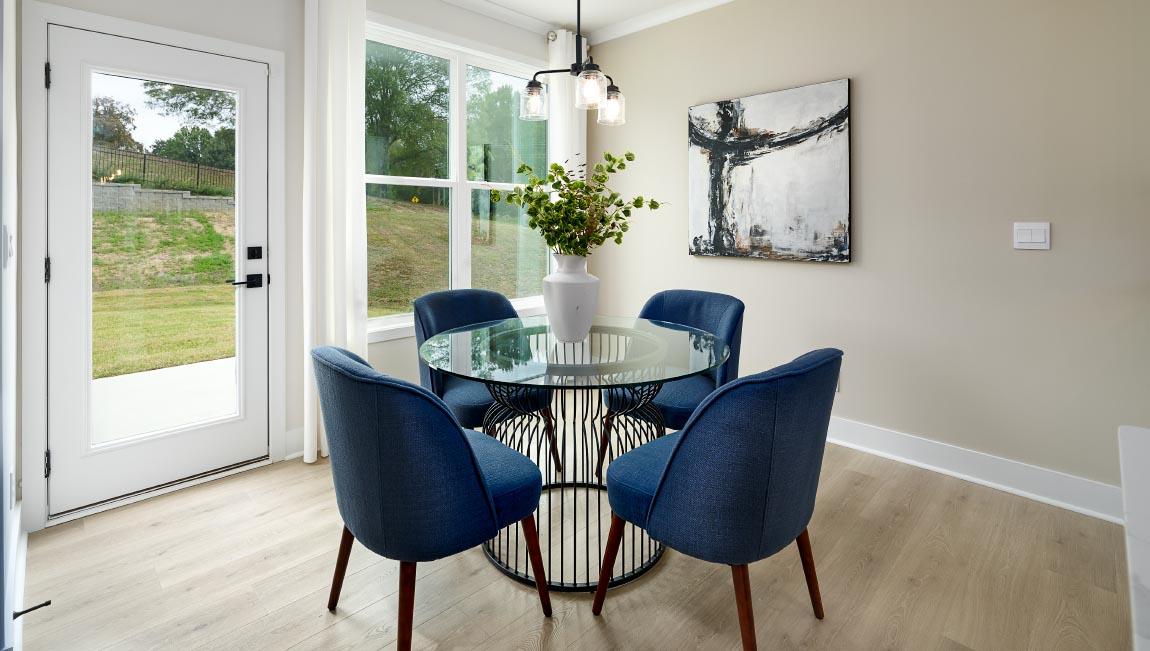 Breakfast area beside kitchen with sliding glass back door