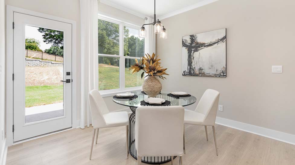 Breakfast area beside kitchen with sliding glass back door